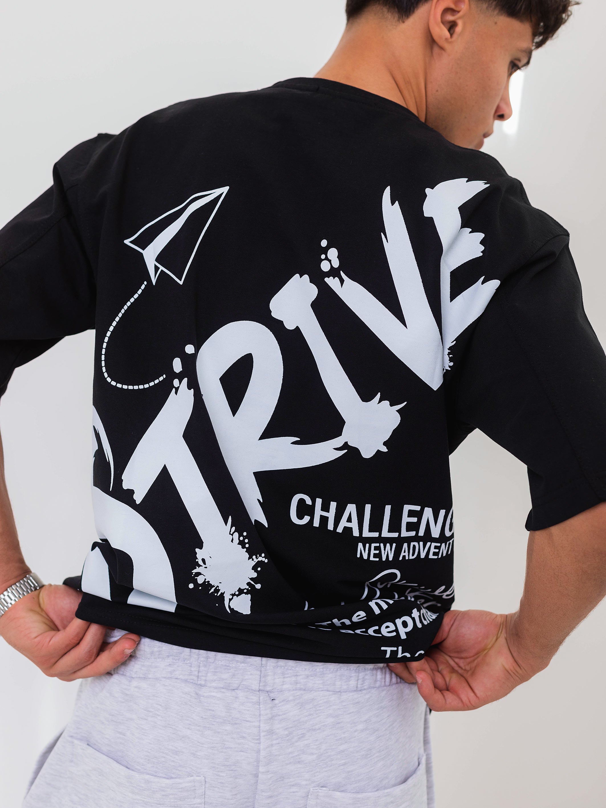 OVERSIZED PRINTED TEE  STRIVE - Black